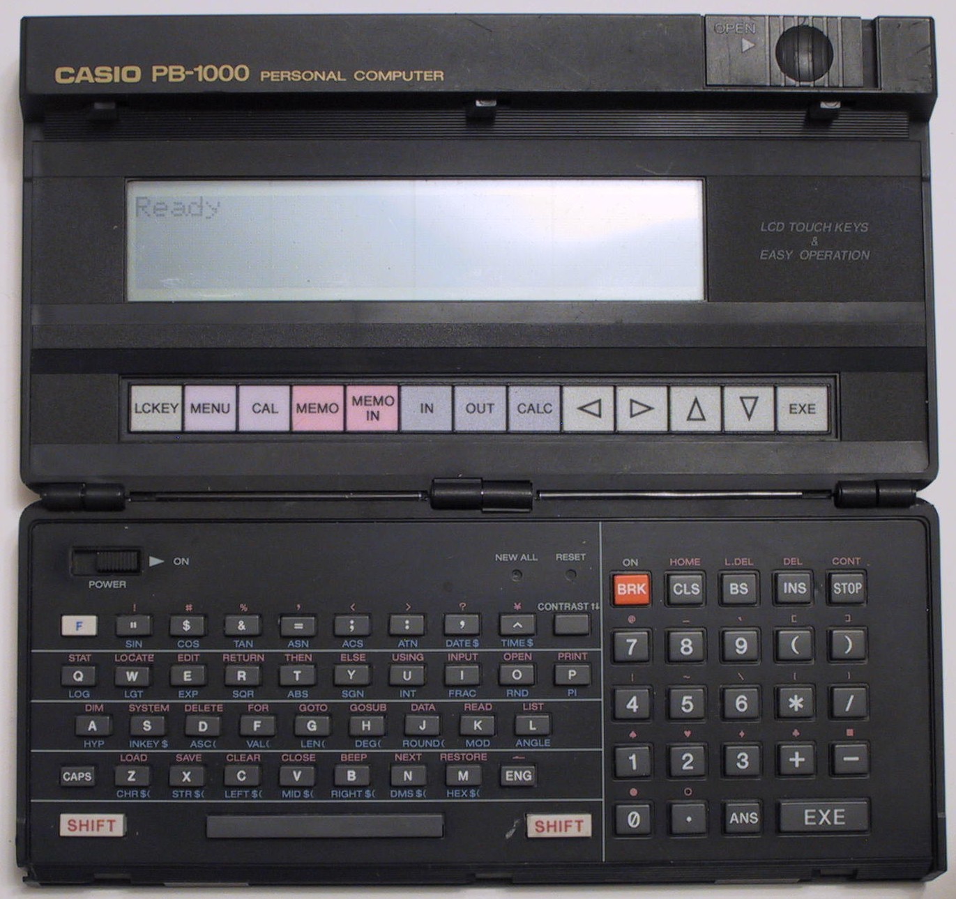 Casio PB-1000 from alternate angle showing clamshell design