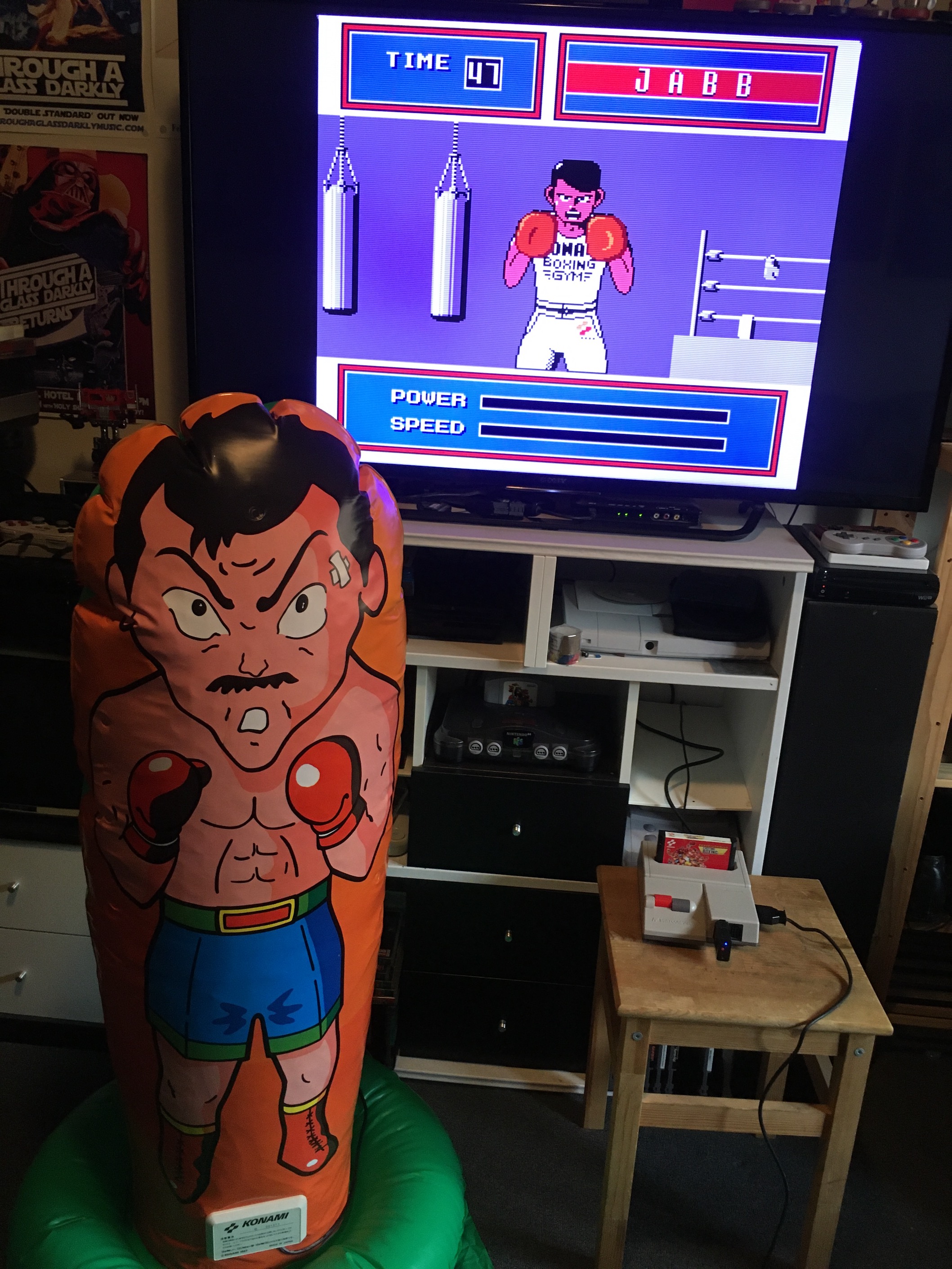 Person physically punching the inflatable Exciting Boxing Controller
