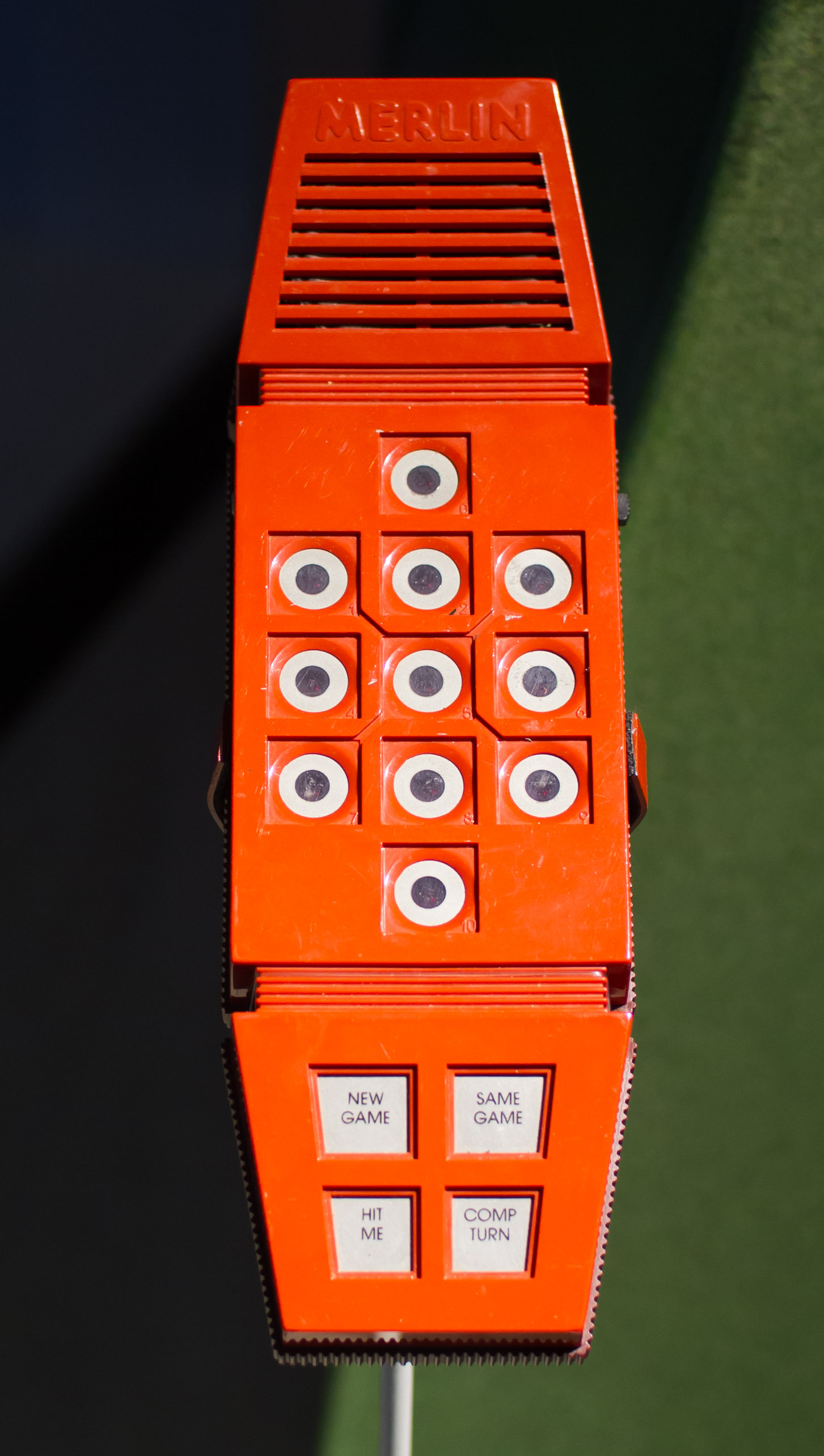 Merlin in its red phone-shaped case