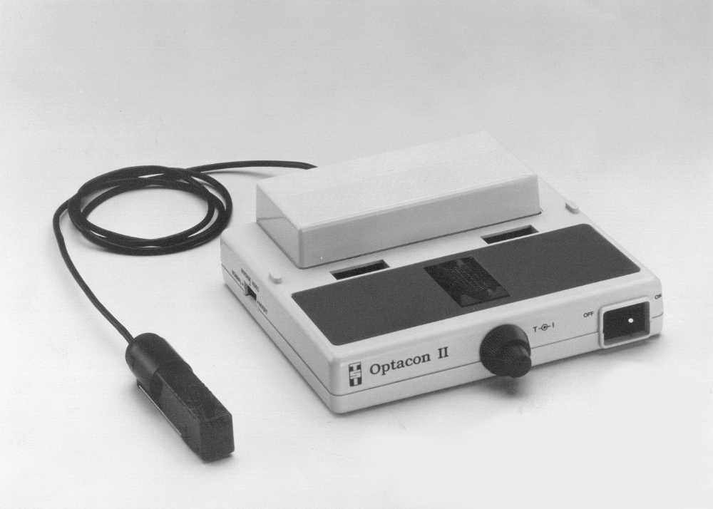 Optacon II tactile reading machine with handheld camera and pin array