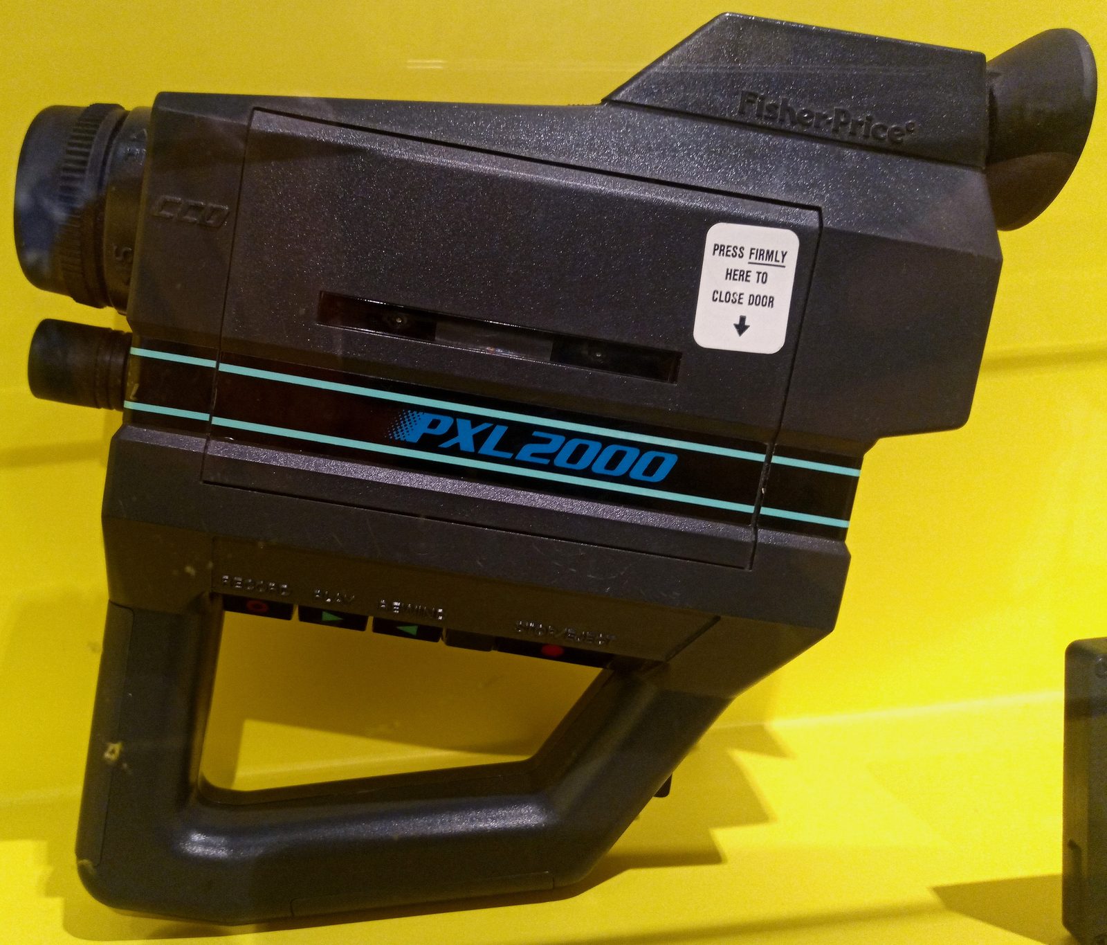 PXL2000 held with its cassette media