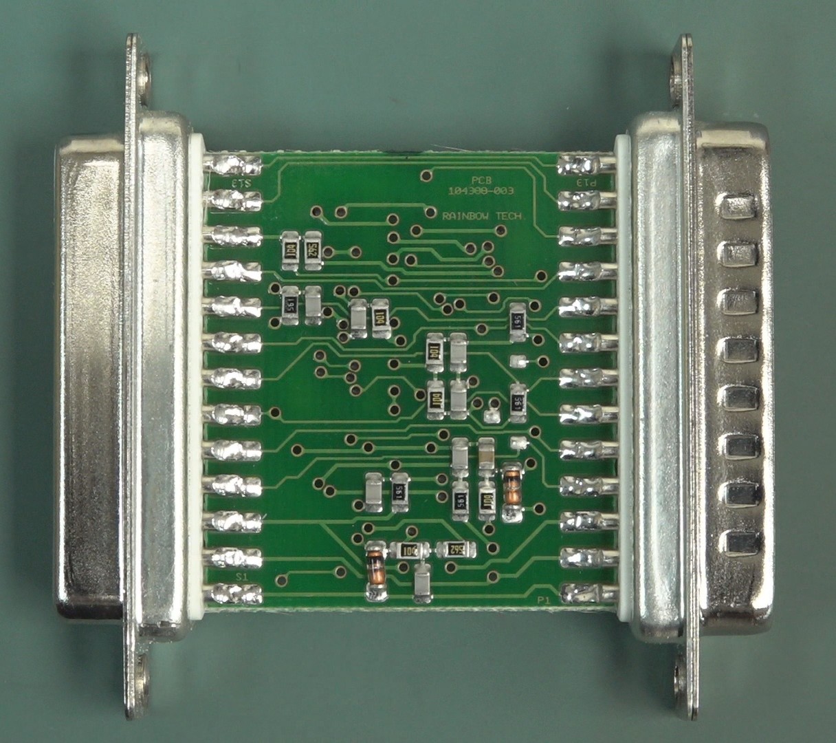 Rainbow Tech parallel port dongle PCB, back side showing the pass-through DB-25 connector