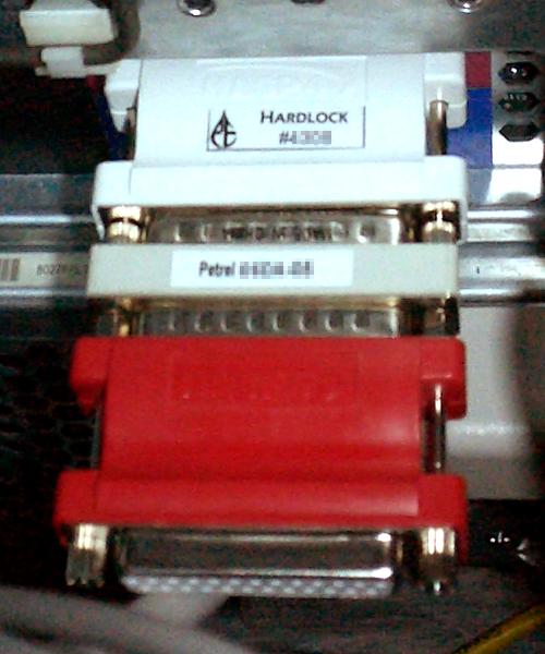 Multiple parallel-port dongles daisy-chained — one per protected application